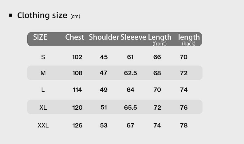 May include: Clothing size chart in centimeters. The chart displays measurements for chest, shoulder, sleeve, and length (front and back) for sizes S, M, L, XL, and XXL. The chart is on a light gray background.