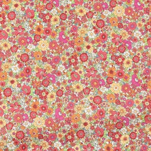 May include: A fabric with a dense floral pattern. The design features a multitude of small flowers in shades of red, pink, orange, and yellow, set against a light green and white background. The overall effect is a vibrant and colorful display.