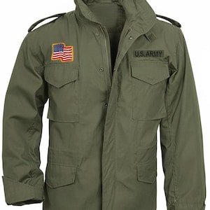 May include: Olive green military-style jacket with a high collar, multiple pockets, and a zipper closure. Features an American flag patch and a "U.S. ARMY" patch. The jacket has epaulets on the shoulders.