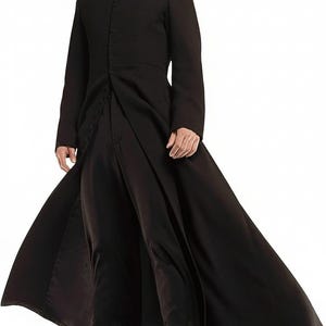 May include: A long, black coat featuring a high collar and a button-down front. The coat is open at the front, revealing black trousers. The coat's design is sleek and flowing, suitable for cosplay or costume events.