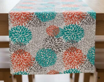 Camino de mesa moderno con estampado floral de colores brillantes Pacific Bloom para interiores y exteriores