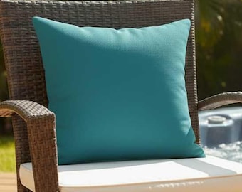Funda de cojín Sunbrella acrílica Spectrum Peacock para interiores y exteriores con cremallera.