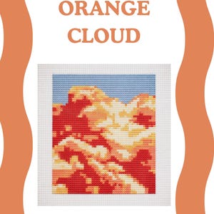 May include: A cross-stitch pattern featuring a vibrant orange cloud design against a blue sky. The words "ORANGE CLOUD" and "CROSS STITCH PATTERN" are displayed in brown text. Decorative orange borders frame the design.