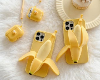 Funda de silicona suave con diseño de plátano en 3D, con agarre antideslizante.