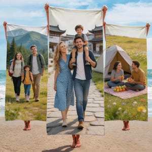 May include: White beach towel featuring three family scenes: a mountain hike, a family walking on a path, and a picnic. Each scene depicts a family enjoying outdoor activities. The towels are held up by unseen hands.