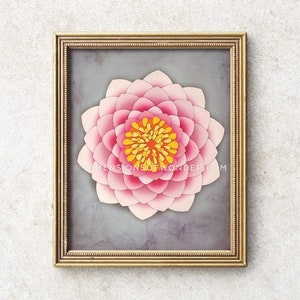 May include: A framed print of a pink and yellow flower with a geometric design. The flower is in the centre of the print and is surrounded by a grey background.
