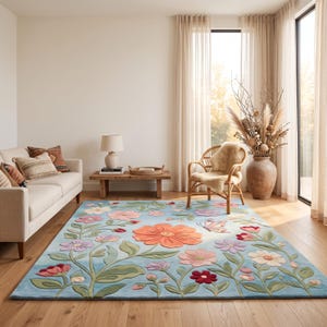 May include: A rectangular area rug featuring a light blue background with a raised, textured floral pattern. The design includes large orange, pink, red, and white flowers with green stems and leaves, accented by a small butterfly motif.