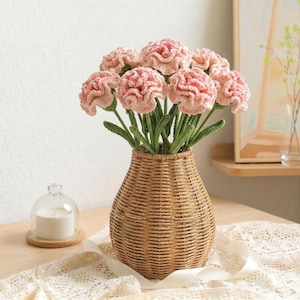 May include: A set of three ceramic mugs with a speckled, matte finish. The mugs are in shades of cream, light gray, and dark gray. Each mug has a simple, minimalist design, perfect for coffee or tea.