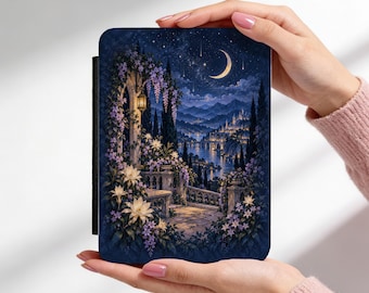 May include: A rectangular e-reader case featuring a dark blue night scene with a crescent moon, starry sky, and a stone balcony adorned with purple wisteria and white flowers overlooking a distant illuminated city and a calm river.