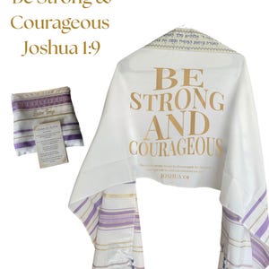 May include: White prayer shawl with gold lettering that reads "Be Strong and Courageous" and "Joshua 1:9". The shawl has purple and gold stripes along the edges and tassels. A matching pouch and card are also visible.
