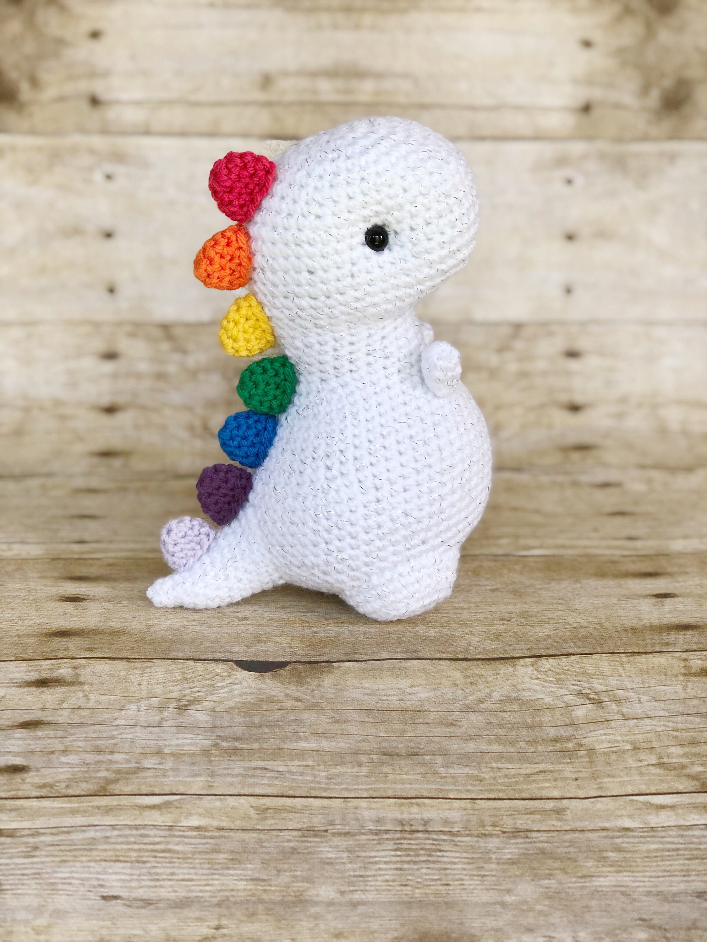 Handmade Crochet Rainbow Dinosaur Plush: White Sparkle Stuffed Toy