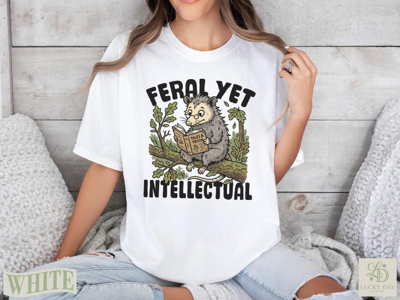 Feral yet intellectual opossum reading a book on a tree branch.