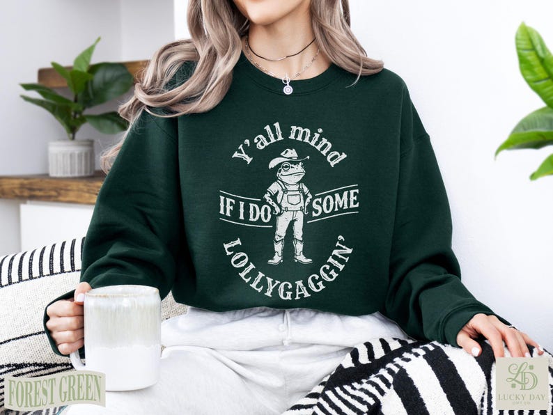 Green sweatshirt with frog graphic and "Y'all mind if I do some lollygaggin" text.