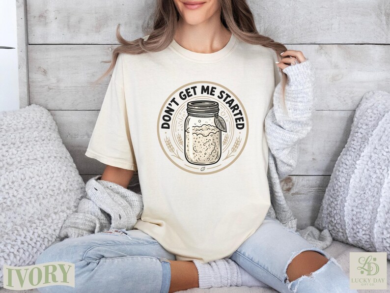Cream t-shirt with "Don't Get Me Started" sourdough jar graphic.