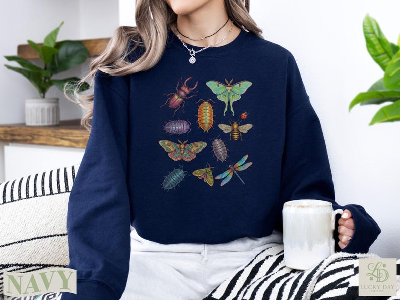Navy sweatshirt with illustrations of various insects and bugs.
