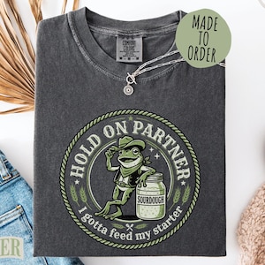 Funny Sourdough T-Shirt | Hold On Partner Cowboy Frog Tee | Rustic Distressed Sourdough Starter Shirt | Baker Gift