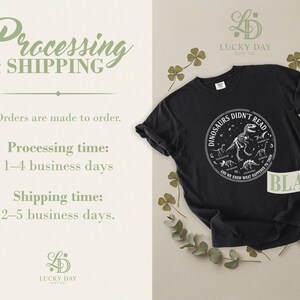 Black t-shirt with "Dinosaurs Didn't Read" graphic, processing and shipping info.
