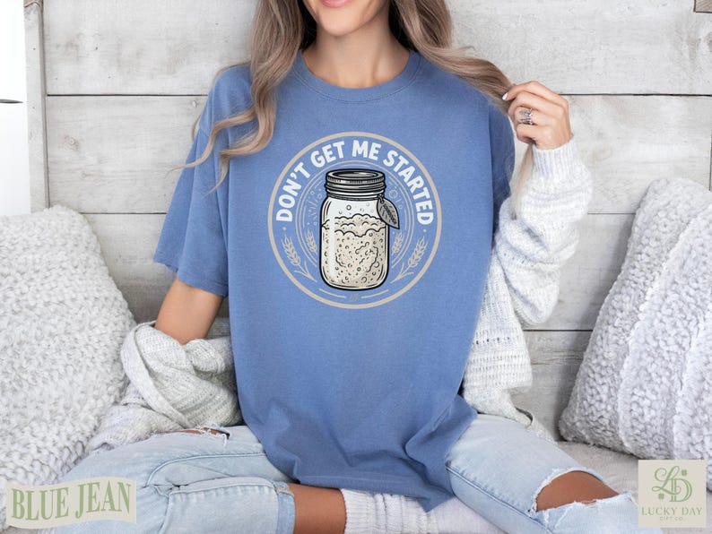 Blue t-shirt with "Don't Get Me Started" and sourdough jar graphic.