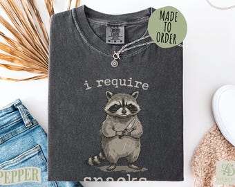 Comfort Colors® I Require Snacks Raccoon Shirt, Funny Goblincore Trash Panda Tee, Cozy Snack Gremlin Animal Lover Gift Top