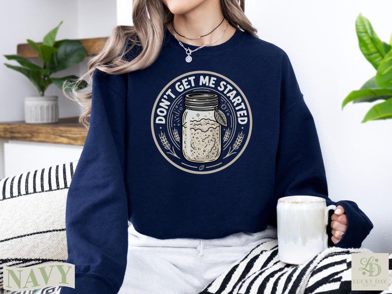 Navy sweatshirt with "Don't Get Me Started" text and a mason jar graphic.