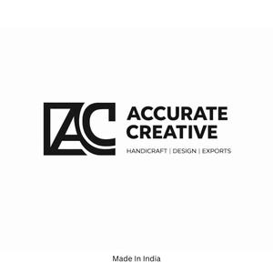 May include: Black and white logo for Accurate Creative, featuring stylized letters "AC" within a square, with the words "ACCURATE CREATIVE" and the tagline "HANDICRAFT | DESIGN | EXPORTS." The text "Made In India" is at the bottom.
