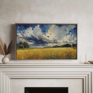 Golden Wheat Field With Birds Printable Wall Art hung in a sunlit office with curated styling