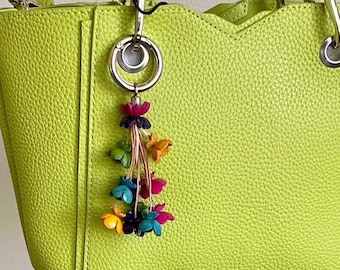 Keke’s leather tassely flower keychain, zipper pull and purse charms - assorted colors