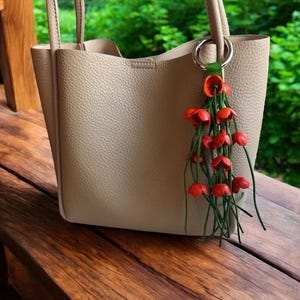 Cassidy’s Leather Flower Fransen-Geldbeutel-Charme in einigen Farben