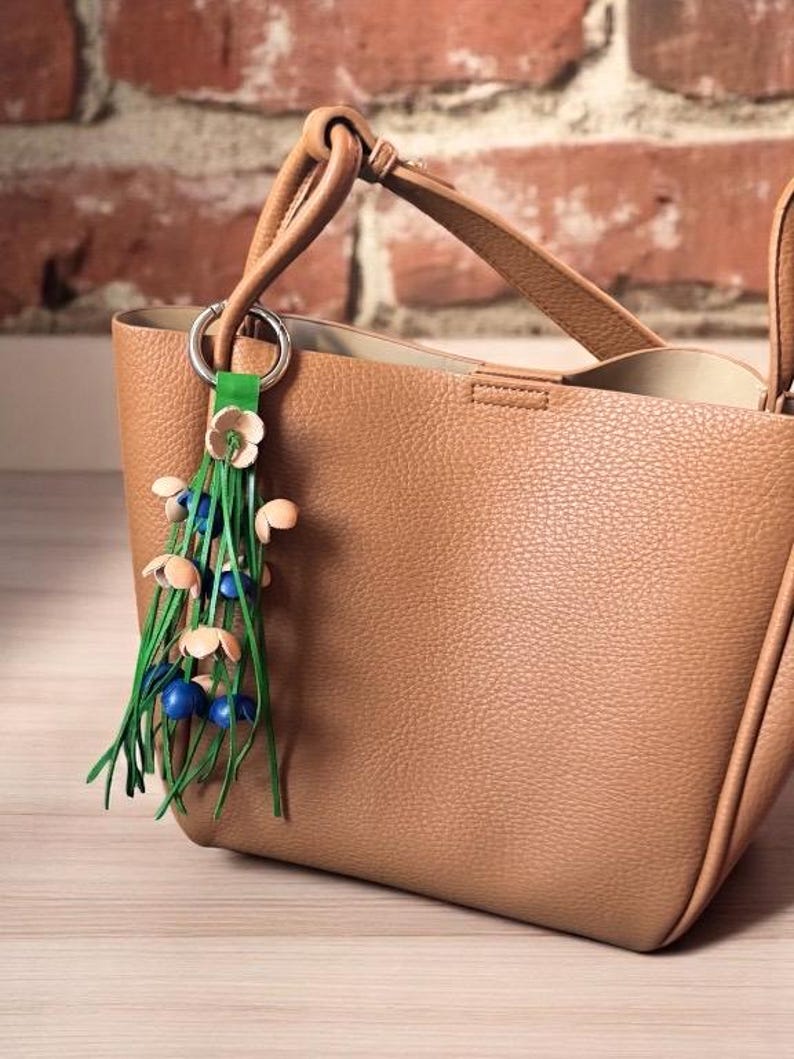 Cassidy’s Leather Flower Fransen-Geldbeutel-Charme in einigen Farben blue+natural