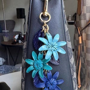 Janna’s Leather flowers on golden chain strand purse / bag charm in fun colors