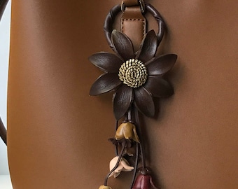 Ellen's keychain and/or purse charm in brown/muted/golden colors