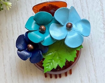 Plumeria flower leather hair comb and bun holder in fun pastel color combination