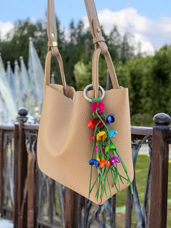 Cassidy’s Leather flower fringe purse charm in some colors