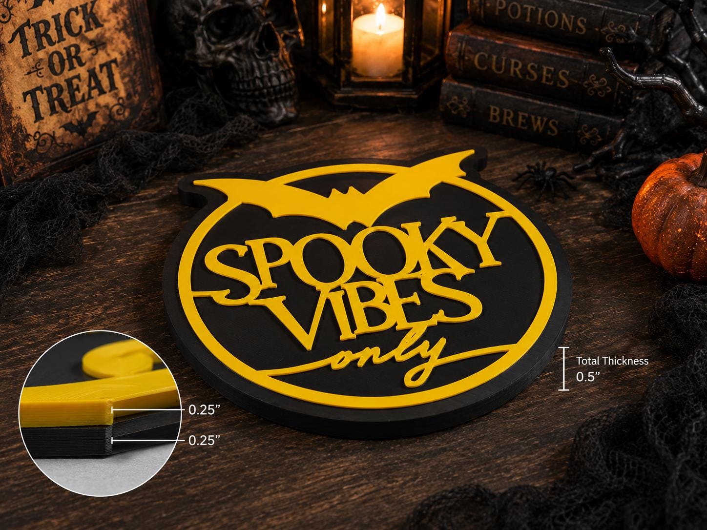 A close up view showing the 0.5 inch thickness of the 3D printed yellow and black seasonal wall sign.
