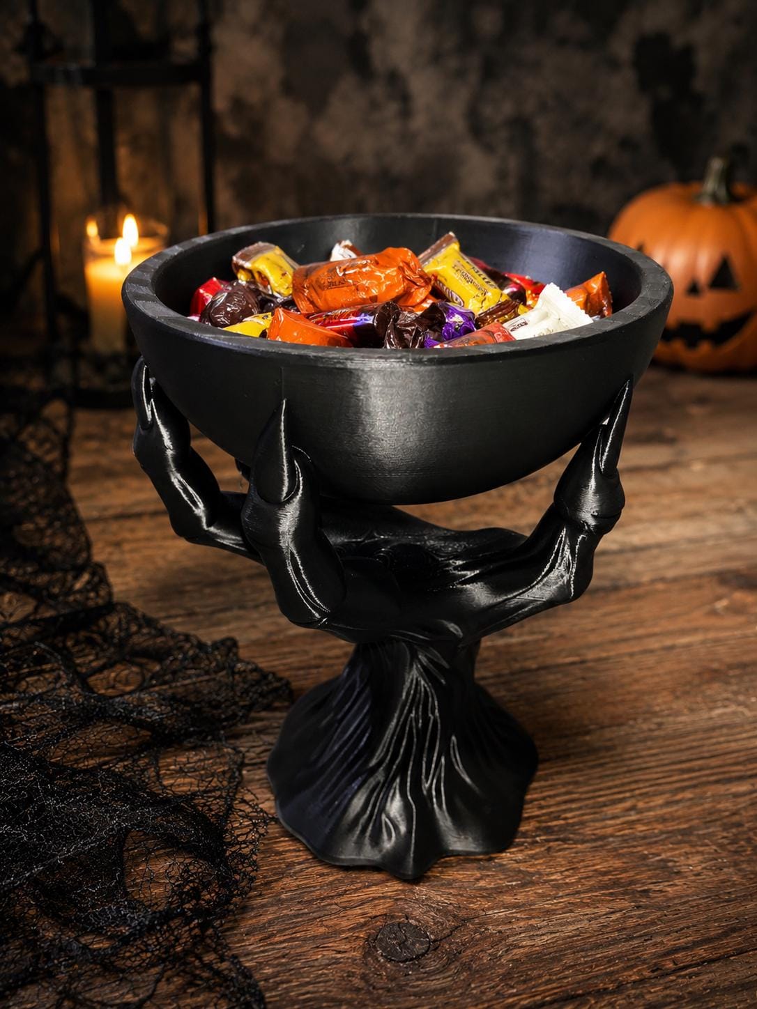 Side view of the 3D printed creepy hand candy bowl showing intricate finger detail.