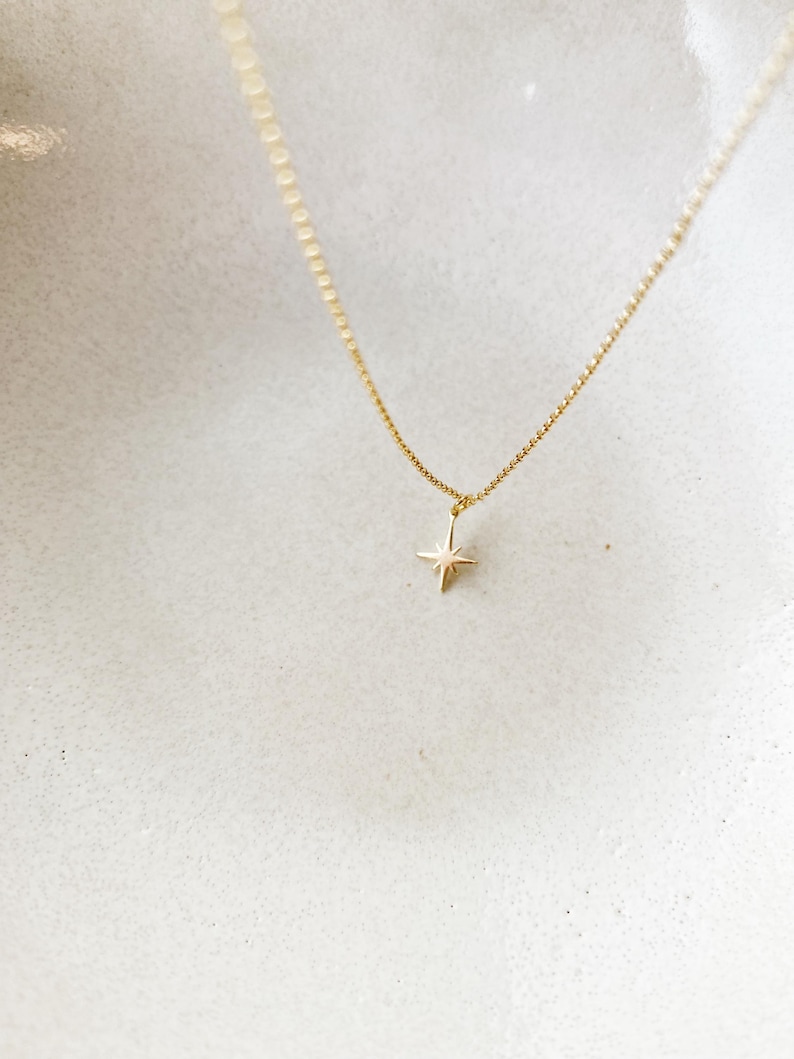 Starburst dainty necklace tiny star. North star necklace. Miscarriage memorial necklace. Celestial jewelry. Star choker