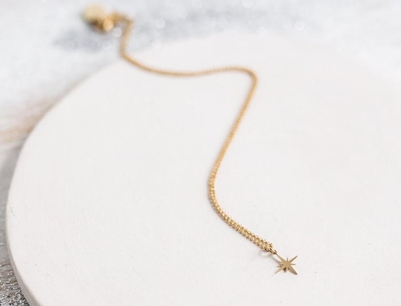 Starburst dainty necklace tiny star. North star necklace. Miscarriage memorial necklace. Celestial jewelry. Star choker
