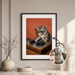 May include: A framed wall art print featuring a gray tabby cat wearing black sunglasses, standing at a wooden turntable and placing a paw on a vinyl record. The background is a solid burnt orange color. A circular inset shows the original cat photo.