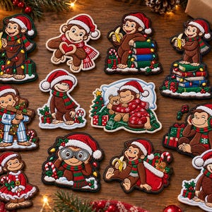 May include: A collection of twelve embroidered patches featuring a brown monkey character in various Christmas-themed scenes, including wearing Santa hats, holding bananas, hugging a teddy bear, looking through binoculars, and sitting on gift boxes.