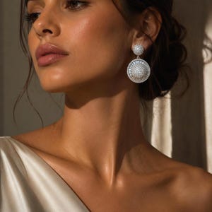 Runde hängende Statement Ohrringe Silber Zirkonia |Luxus Gala Ohrhänger mit Baguette Kristall| Funkelnde Swarovski Braut Ohrringe Rhodiniert