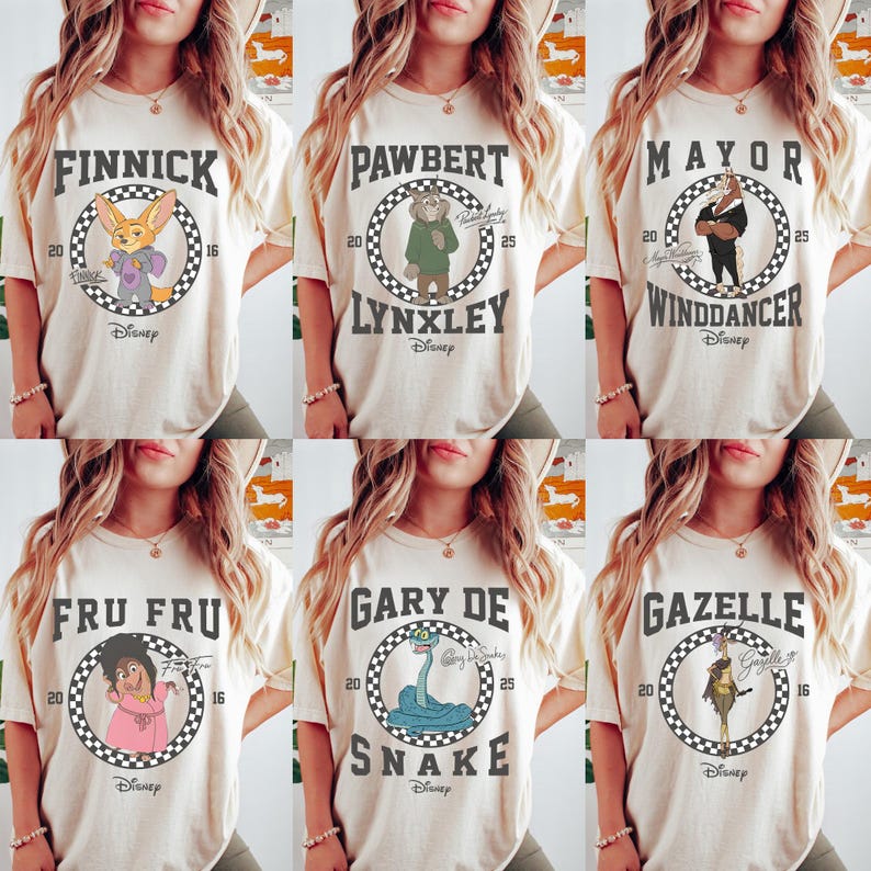 May include: Cream-colored t-shirts featuring characters from the Disney movie Zootopia. Each shirt displays a character's name in a circular design with the Disney logo. Characters include Finnick, Pawbert Lynxley, Mayor Winddancer, Fru Fru, Gary De Snake, and Gazelle.