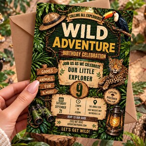 May include: A rectangular birthday invitation card featuring a jungle theme with a toucan, a leopard, a pith helmet, binoculars, and a lantern. The text reads Wild Adventure Birthday Celebration, Join Us As We Celebrate Our Little Explorer, 9, and event details.
