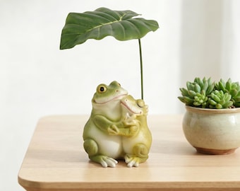 Adorable pareja de ranas con sombrilla de hoja de loto, adorno de resina — Decoración para macetas de suculentas y jardines de bonsáis, linda figura para mesa o patio.