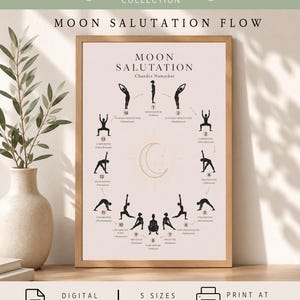 May include: A framed wall art print titled Moon Salutation Chandra Namaskar featuring a circular diagram of fourteen black yoga silhouettes on a light background with a central gold crescent moon icon and numbered instructional text for each pose.