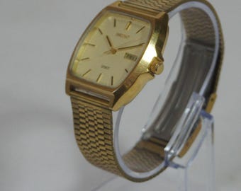 Gent's Gold Tone Seiko Spirit 7N43-5040 Quartz Day/Date Champagne Wristwatch