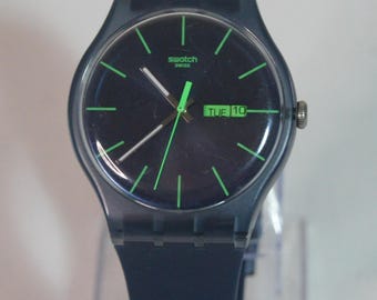 Working Swatch AG-2010 Blue Rebel Unisex Quartz Day/Date Wristwatch Men’s Watch