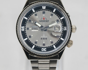 Orient EM00-C0 Stainless Steel 10 Bar 21 Jewel Automatic Day/Date Wristwatch