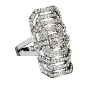 May include: A silver ring with a rectangular, geometric design. The ring is encrusted with numerous small, sparkling diamonds, creating a dazzling effect. The ring's band is a simple, polished silver.