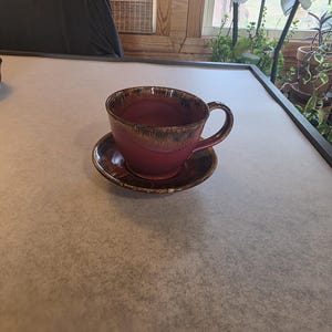 1996 Lufkin Pottery Cup and Saucer – Ruby Bronze Reactive Glaze Seagrove Stoneware