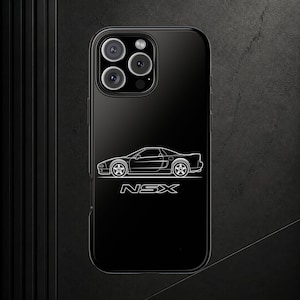 May include: A black smartphone case featuring a white line art illustration of an NSX sports car in profile view. Below the car graphic, the text NSX is printed in a bold, white, outlined font. The case has a cutout for a triple camera system.